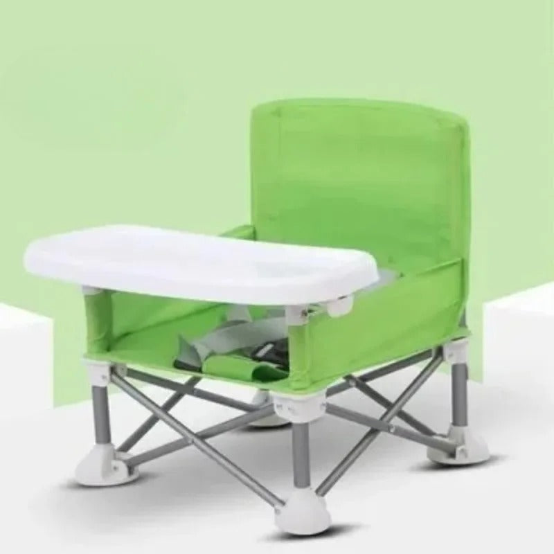Chaise haute portable lime avec plateau amovible.