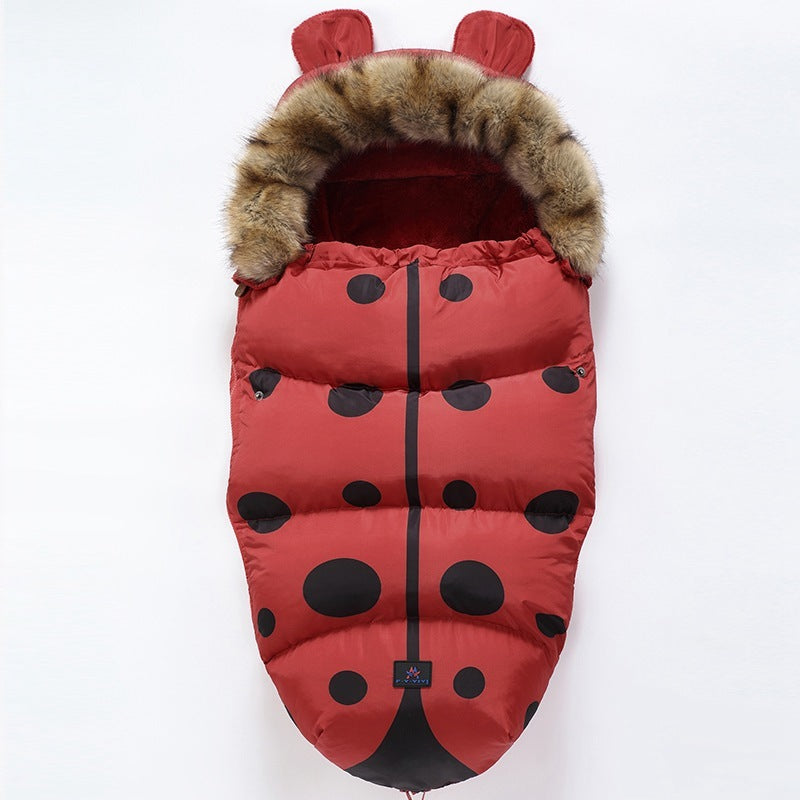 Chancelière bébé rouge design coccinelle.