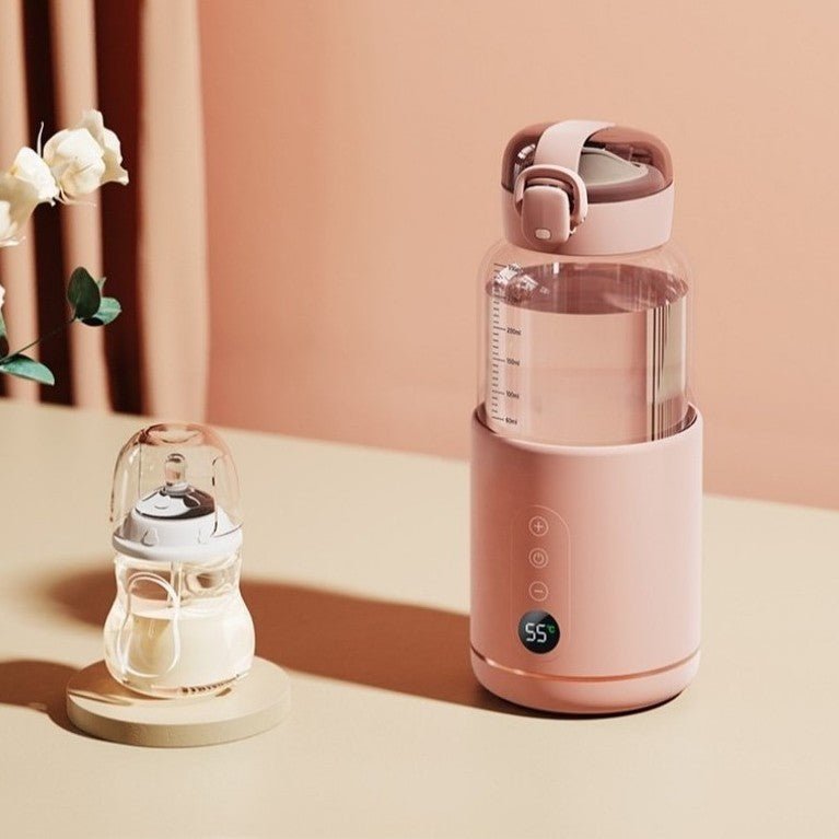 Chauffe biberon rose et petit biberon.