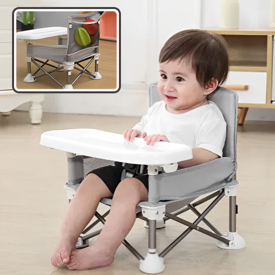 Enfant assis dans petite chaise haute bébé portative