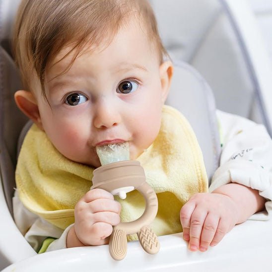 Grignoteuse bebe beige.