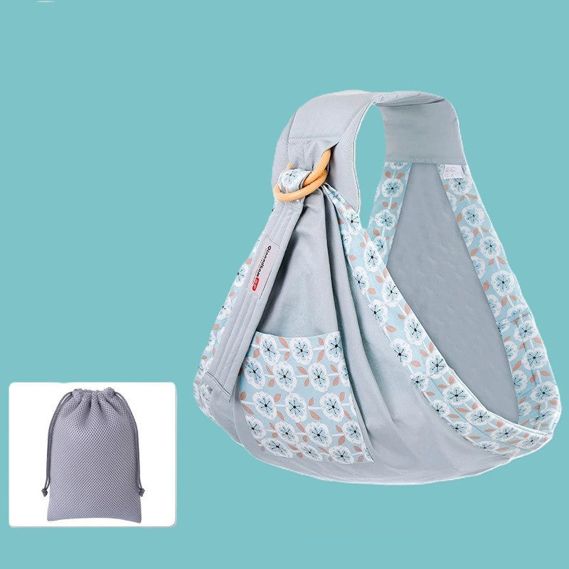 Porte bébé gris motif fleuri et sac rangement