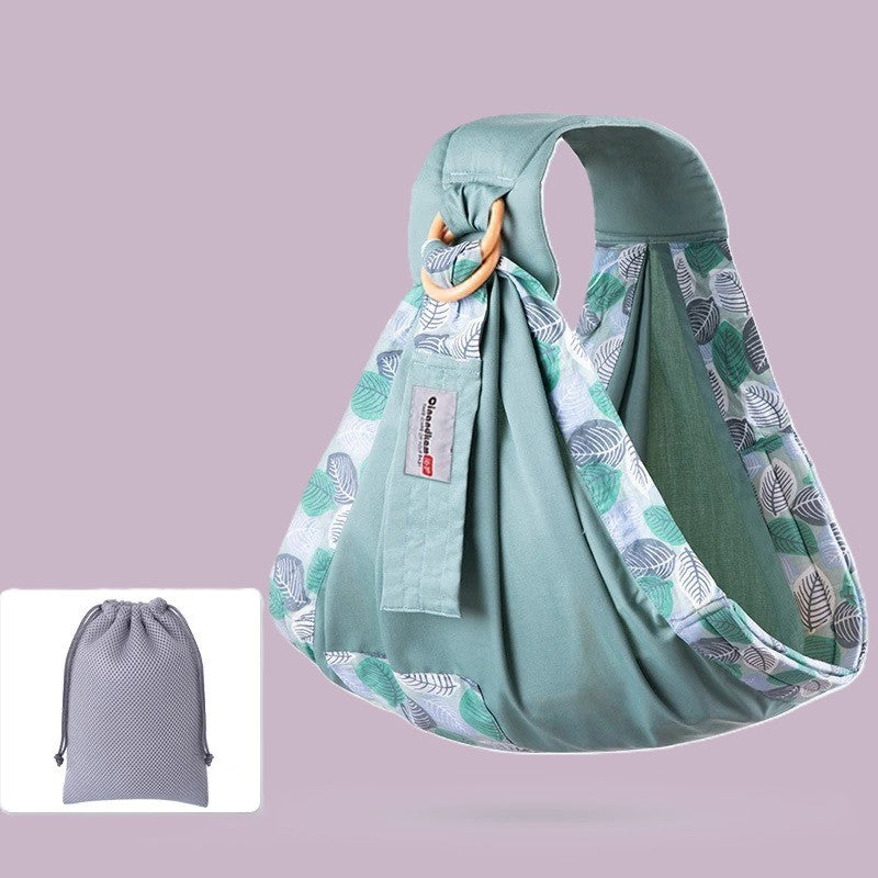 Porte bébé vert motifs feuilles et sac rangement