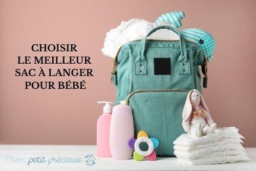 Sac a langer turquoise avec produits essentiels pour prendre soins de bébé.