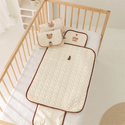 Tapis à langer nomade | Compact et Hygiénique