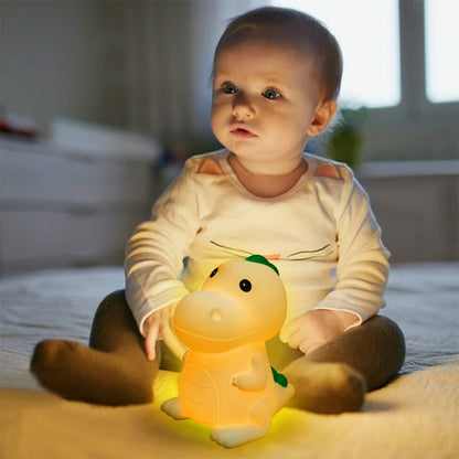 Bébé assis avec veilleuse bebe jouet