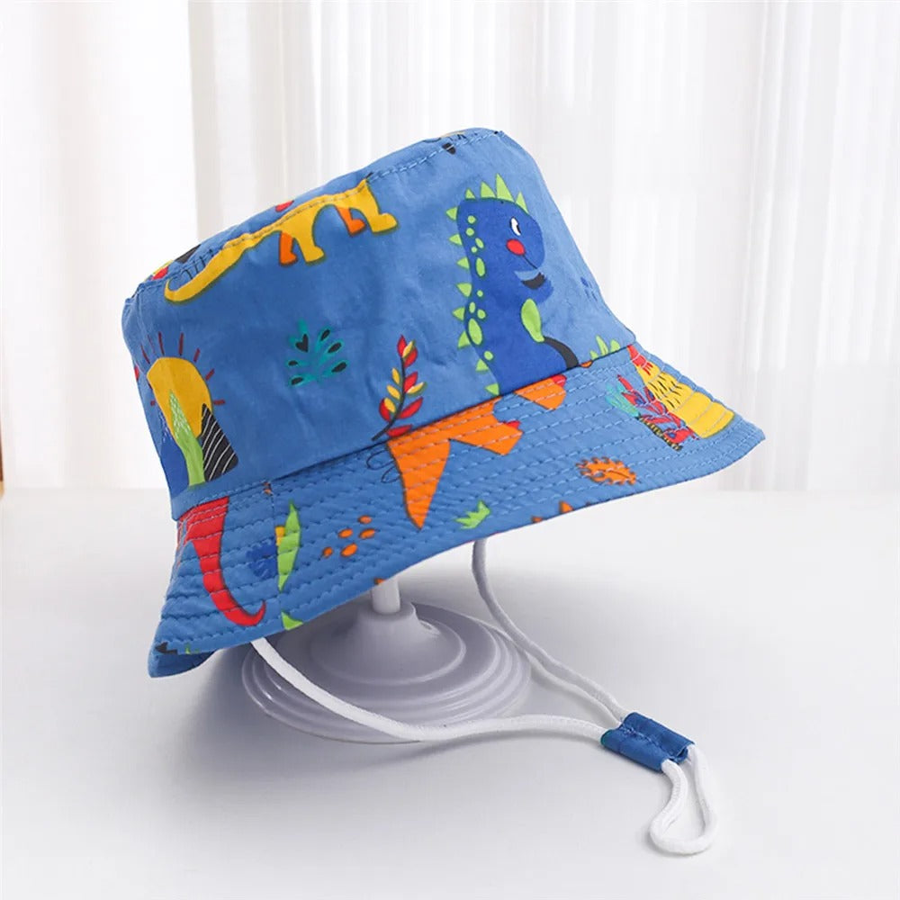 Chapeau bebe dinosaure protection UV pour voyages.