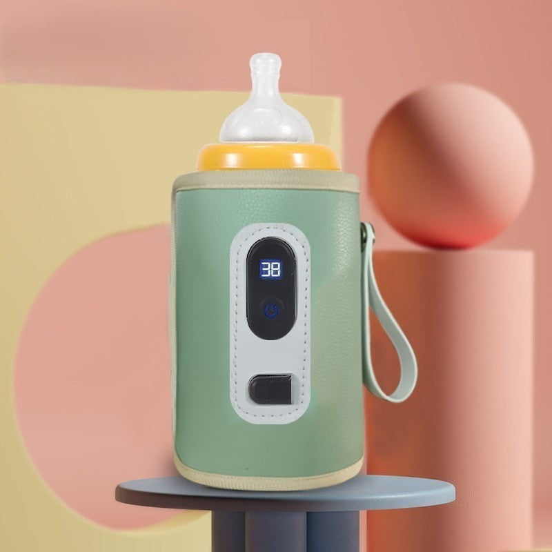 Chauffe biberon nomade vert