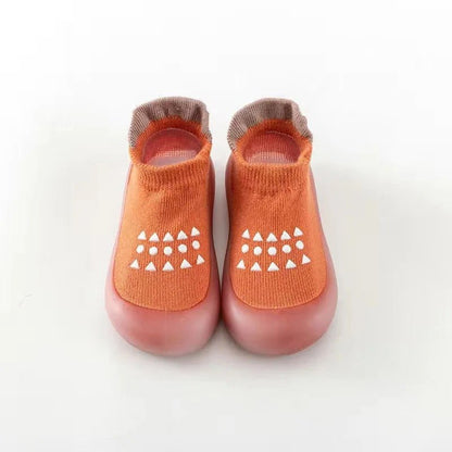 Chaussure bebe en tissu enfilable orange.