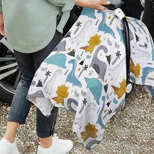 Couverture siege auto en mousseline respirante avec motifs Dinos.