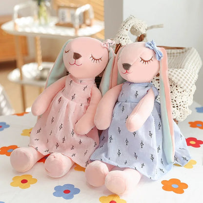 Deux lapines peluche rose doudou bébé