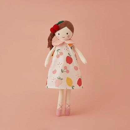 Doudou bébé poupée brunette tressée robe fruitée