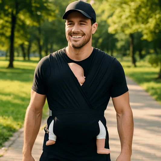 Papa sportif en promenade avec écharpe de portage koala noir