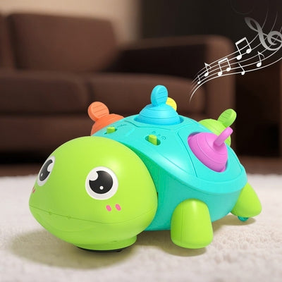 Jouet bebe tortue rampante musicale lumineuse.