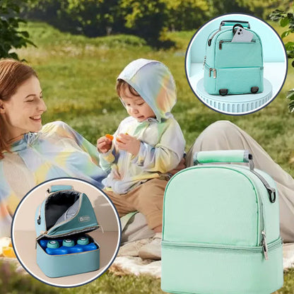 Maman et enfant sur la pelouse avec sac bebe isotherme