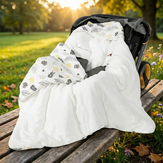 Nid d'ange siege auto sur banc de parc.