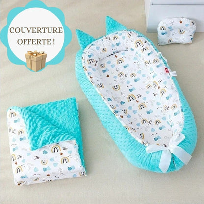 Nid d'ange turquoise et couverture assortie