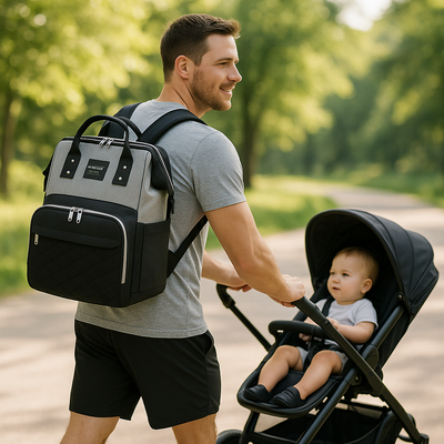 Papa en promenade avec son bébé et son sac à langer grande capacité.