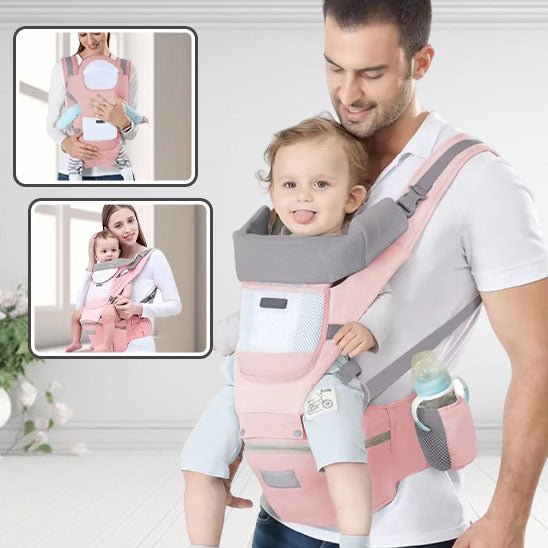 Papa transportant bébé dans porte bebe évolutif rose