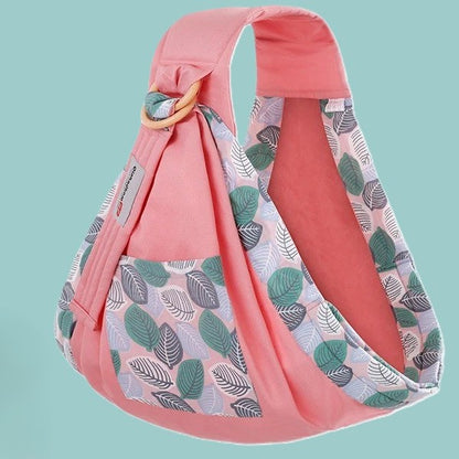 Porte bebe rose aux motifs feuilles.