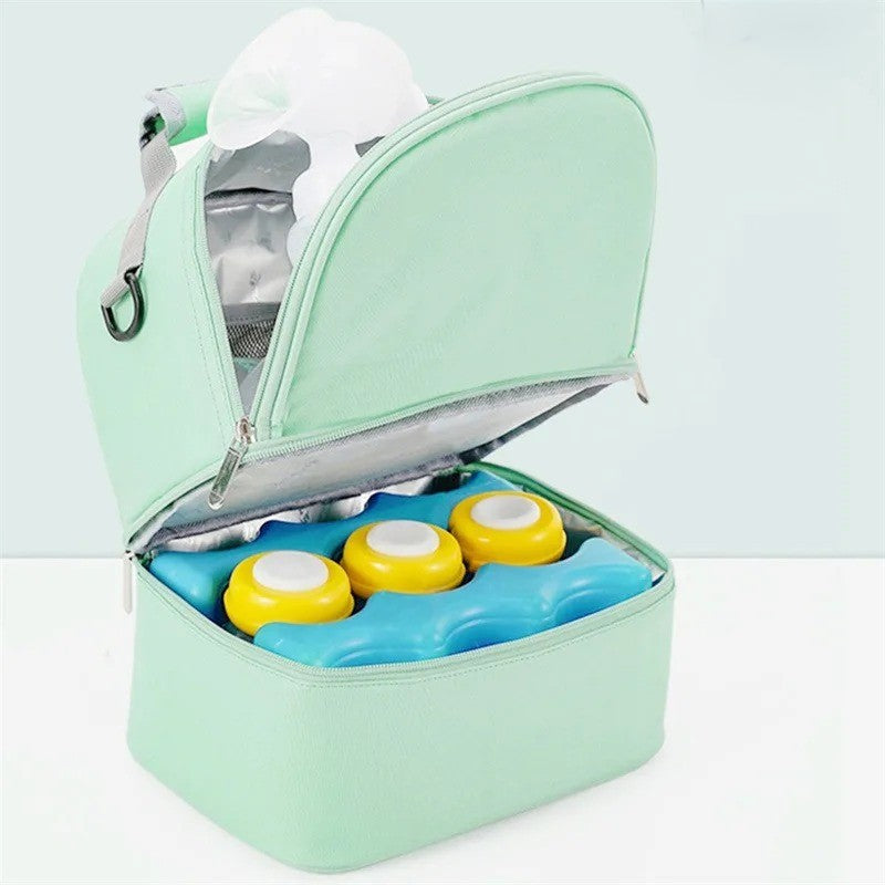 Sac bebe isotherme vert et glaçons pour biberons.