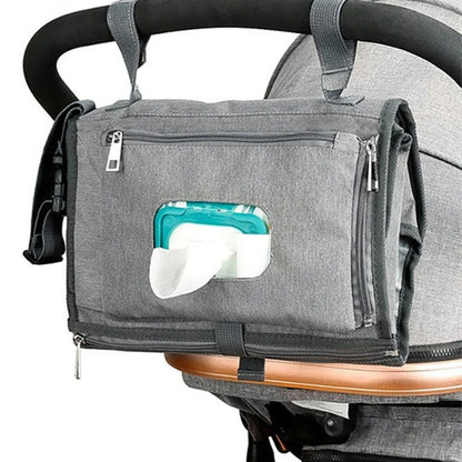 Tapis à langer nomade gris avec sangles poussette.