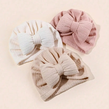 Turban bebe fille trois couleurs douces.